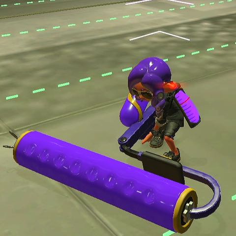 an octoling wielding a paint roller, pressed into the floor