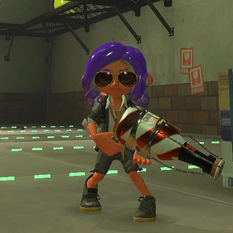 an octoling holding the squeezer, a weapon that looks like a champagne bottle with a caged cork